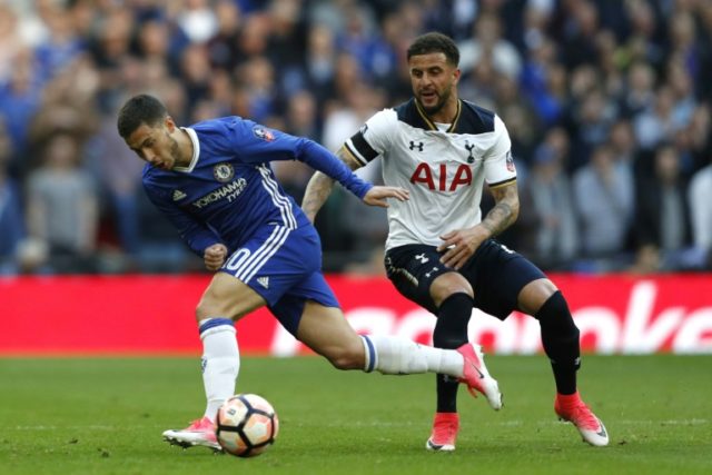 Chelsea's Eden Hazard (L) fights for the ball with Tottenham Hotspur's Kyle Walker during
