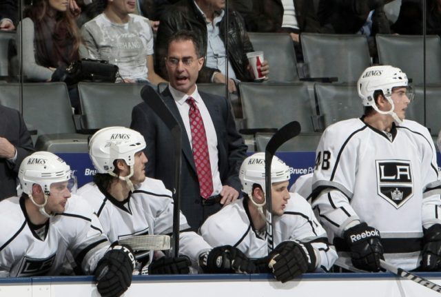 John Stevens (C) guided the Los Angeles Kings to a 2-2 mark as an interim coach in the 201