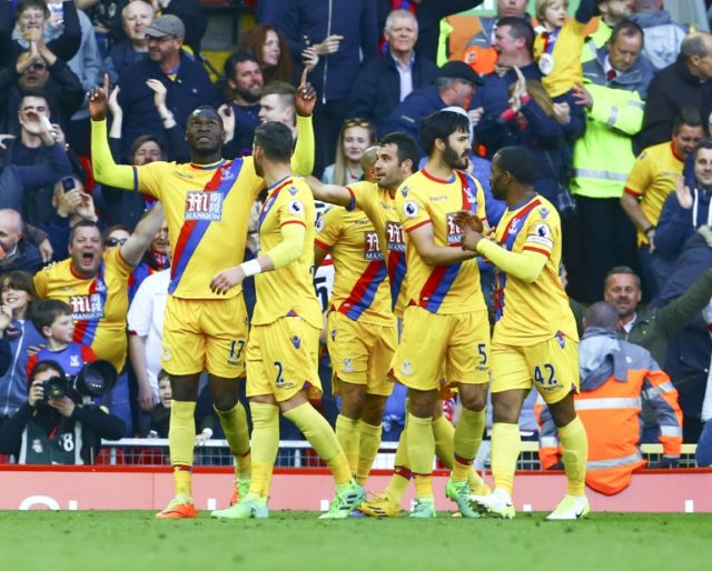 Crystal Palace's striker Christian Benteke (L) celebrates scoring a goal against Liverpool