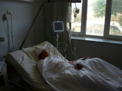 A wounded Afghan soldier in hospital in Mazar-i-Sharif on April 22, 2017, following a bloody Taliban attack on an army base