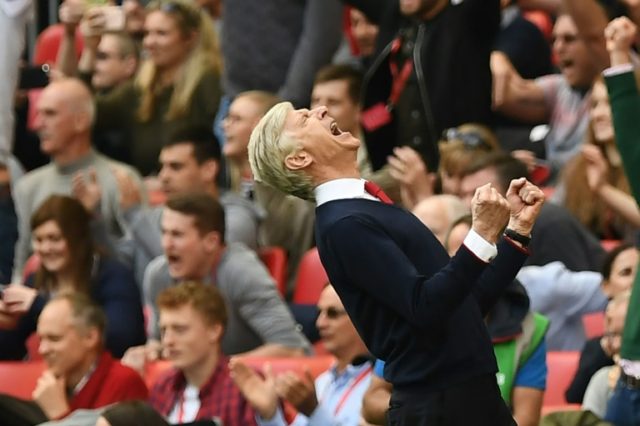 Arsenal's manager Arsene Wenger celebrates victory after the FA Cup semi-final football ma