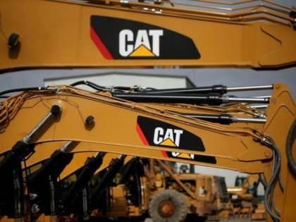 Shares of Caterpillar rose sharply in pre-market trading on the report as both earnings and revenues bested analyst expectations by wide margins