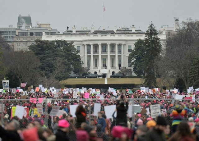 Demonstrators protest near the White House in Washington, DC, during the Women's March on