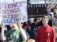 Scientists leave labs, take to streets to defend research Photo The Associated Press