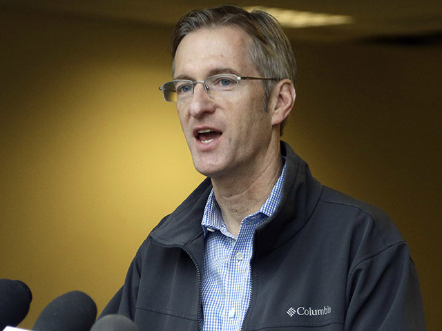 In this Jan. 17, 2017 photo, Portland Mayor Ted Wheeler speaks during a press conference in Portland, Ore. Wheeler is condemning the actions of some protesters after a May Day march took a violent turn in Portland Monday, May 1, 2017. (AP Photo/Don Ryan)