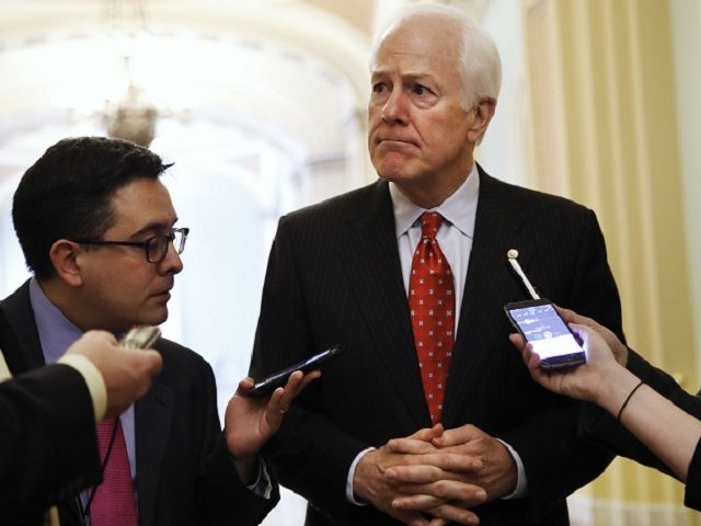 Senate Majority Whip John Cornyn of Texas, talks with reporters about President Trump's decision to fire FBI Director James Comey, on Capitol Hill in Washington, Wednesday, May 10, 2017. (AP Photo/Jacquelyn Martin)