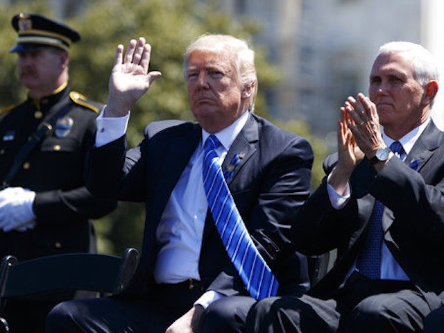 Vice President Mike Pence applauds as President Donald Trump is introduced to speak at the