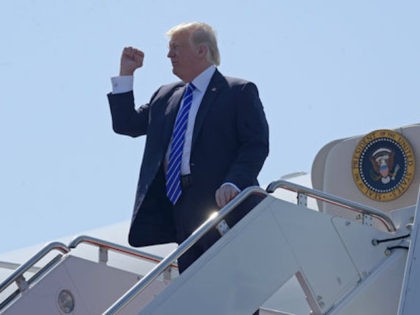 President Donald Trump walks off of Air Force One at Groton-New London Airport in Groton, Ct., Wednesday, May 17, 2017. Trump is giving the commencement address at the United States Coast Guard Academy. (AP Photo/Susan Walsh)