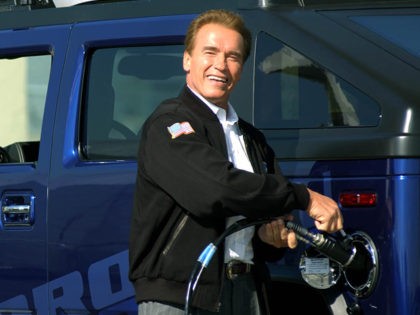 California Gov. Arnold Schwarzenegger fills up the first Hydrogen Hummer made as he joined