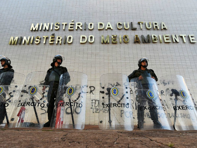 Brazilian Army military police personnel in riot gear guard public buildings in Brasilia,