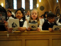 Catholic-School-Kids-Praying-Reuters