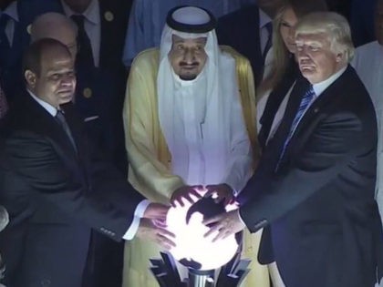 Donald Trump touching a glowing orb in Saudi Arabia.