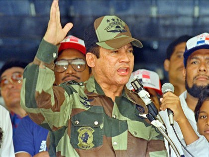 General Manuel Antonio Noriega speaks 20 May 1988 in Panama City during the presentation of colors to the San Miguel Arcangel de San Miguelito volunteer batallion. Noriega said that discussions with the U.S. could not continue as long as the U.S. continued its agression and that Panamian democracy will not …