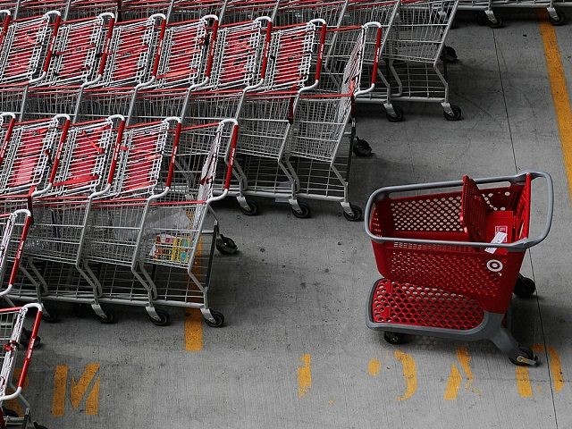 NEW YORK - AUGUST 18: A Target shopping cart (R) stands among other carts in a parking lot outside of Target's new Harlem store August 18, 2010 in New York City. Target Corporation's quarterly earnings rose 14 percent, the company's chief financial officer Douglas Scovanner announced today. (Photo by Chris …
