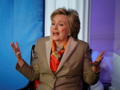 Hillary Clinton speaks at the Women for Women event on Tuesday. (BRENDAN MCDERMID/REUTERS)