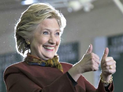 Hillary thumbs up Mary AltafferAP