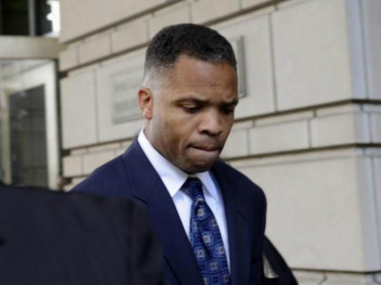 FILE - In this Aug. 14, 2013, file photo, former Illinois Rep. Jesse Jackson Jr., leaves federal court in Washington after being sentenced to 2 1/2 years in prison for misusing $750,000 in campaign funds. Jackson Jr. will be released from a federal prison on Thursday, March 26, 2015, and …