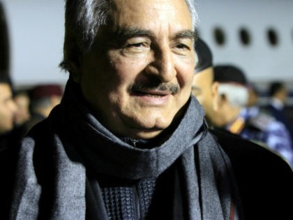 Marshal Khalifa Haftar, the military leader of the so-called Libyan National Army and Libyas parallel parliament based in the eastern city of Tobruk, is greeted upon his arrival at Al-Kharouba airport south of the town of al-Marj, about 80 km east of the Mediterranean port city of Benghazi on December …