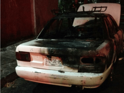 Monterrey burned out car