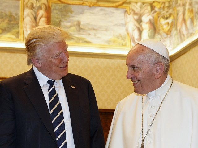 Pope Francis (R) exchanges gifts with US President Donald Trump and US First Lady Melania Trump during a private audience at the Vatican on May 24, 2017. US President Donald Trump met Pope Francis at the Vatican today in a keenly-anticipated first face-to-face encounter between two world leaders who have …
