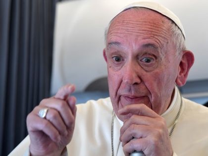 Pope Francis addresses journalists during the traditional press confernce on his flight back to Rome following a two-day visit at Fatima in Portugal, on May 13, 2017. / AFP PHOTO / POOL / TIZIANA FABI (Photo credit should read TIZIANA FABI/AFP/Getty Images)