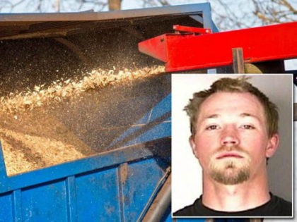 Scott Edward Iverson is accused of trying to shove a coworker into a running wood chipper.