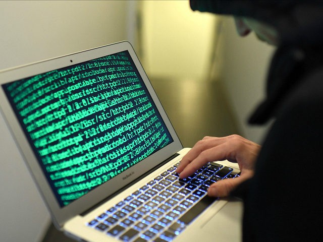 Illustration of cybercrime (Photo credit should read "HELMUT FOHRINGER/APA-PictureDesk via AFP") Helmut Fohringer / APA-PictureDesk / APA