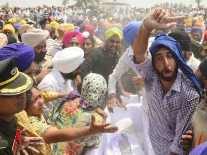 AMRITSAR, INDIA - MAY 2: Relatives and Residents during cremation of martyr Indian army so