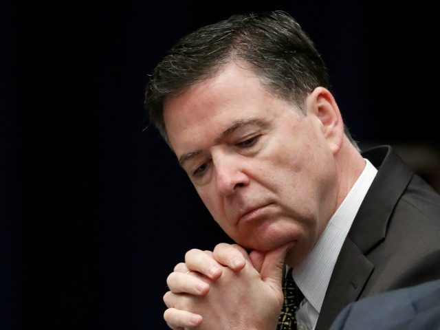 FBI Director James Comey listens before a meeting of the Attorney General’s Organized Crime Council and Organized Crime Drug Enforcement Task Forces (OCDETF) Executive Committee to discuss implementation of the President’s Executive Order 13773, at the Department of Justice, Tuesday, April 18, 2017, in Washington. (AP Photo/Alex Brandon)