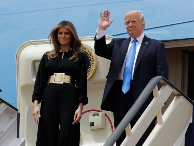 President Donald Trump and first lady Melania Trump arrive at the Royal Terminal of King K