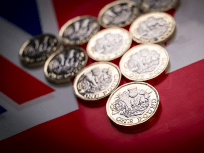 In this photo illustration the new £1 pound coin is seen on April 4, 2017 in Bath, England. Currency experts have warned that as the uncertainty surrounding Brexit continues, the value of the British pound, which has remained depressed against the US dollar and the euro since the UK voted …