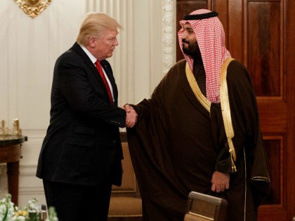 FILE -- In this March 14, 2017, file photo, President Donald Trump shakes hands with Saudi Defense Minister and Deputy Crown Prince Mohammed bin Salman, in the State Dining Room of the White House in Washington. Saudi Arabia is making every effort to dazzle and impress President Donald Trump on …