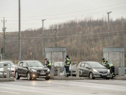 MALMO, SWEDEN - FEBRUARY 06: Swedish police officers check driver's IDs at the Oresun