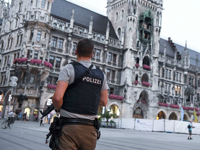 A policeman stands guard at the Marienplatz square in Munich, southern Germany, on July 22