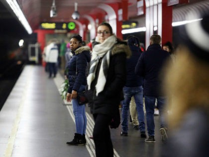 VIENNA, AUSTRIA - DECEMBER 01: A woman waits for subway at Reumannplatz station on Decembe