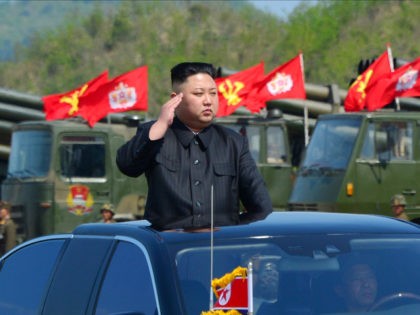 This undated picture released by North Korea's official Korean Central News Agency (KCNA) on April 26, 2017 shows North Korean leader Kim Jong-Un (C) attending the combined fire demonstration of the services of the Korean People's Army in celebration of its 85th founding anniversary at the airport of eastern front. …