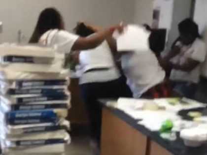 A teacher and a staff member brawled with each other in front of students at a Georgia mid