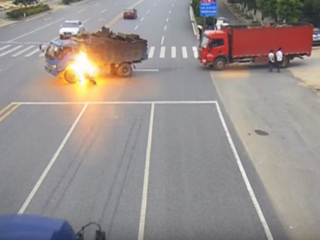 A motorcyclist in China survived a crash Saturday in which his motorcycle burst into flame