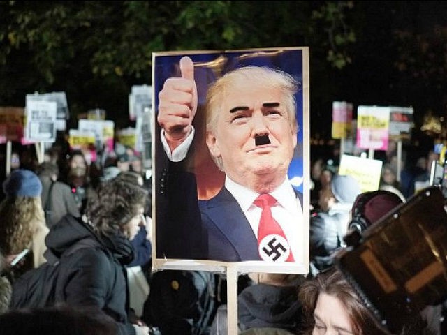 Hundreds of people gather outside the American embassy in London on 9 November 2016 to protest against the election of Donald Trump as president of the US. During the protest two supporters of the far-right EDL showed up to give their support to Trump. (Photo by Jay Shaw Baker/NurPhoto via …