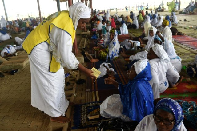Worshippers at Sunday prayer at the Nasrul-lahi-li Fathi Society of Nigeria, where Islam i
