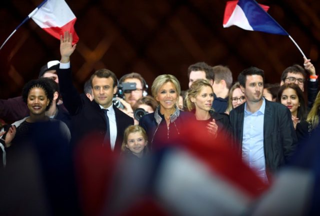 Emmanuel Macron with his wife Brigitte and members of her family at a victory party after