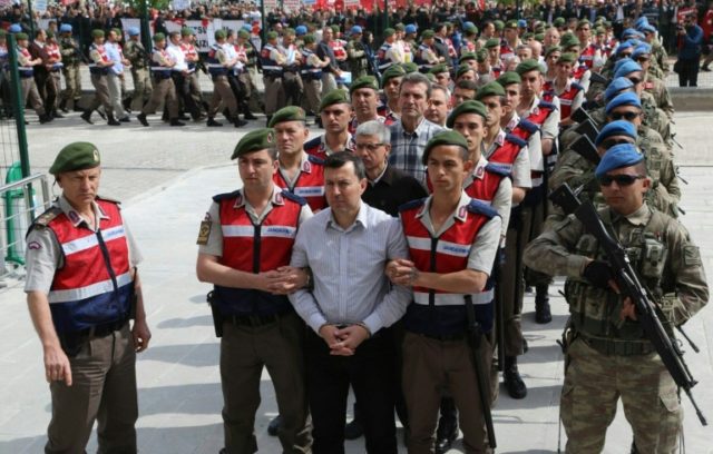 The suspects in the trial over the attempted coup in Turkey last year are paraded into the