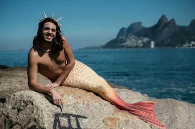 Davi de Oliveira Moreira, known as Sereio (merman in Portuguese), poses in his mermaid tai
