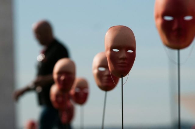 A protest against political corruption scandals in Brazil on Tuesday placed 595 masks -- o