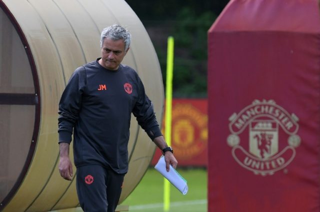 Manchester United's Jose Mourinho arrives to attend a team training session at the club's