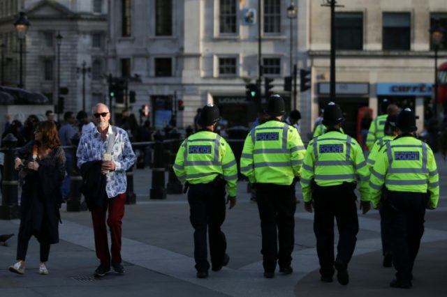 British police patrol through Trafalgar Square in central London on May 23, 2017 a day aft
