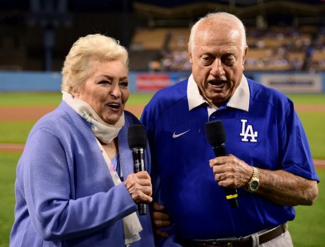 Tommy (R) and Jo Lasorda make the "play ball" announcement at Dodger Stadium in 2016