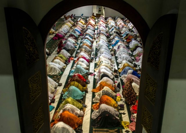 Indonesian Muslims pray during the start of the holy month of Ramadan. More than 1.5 billi