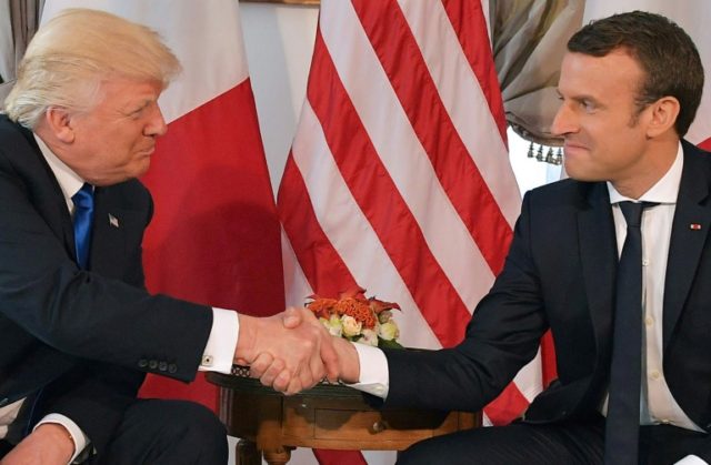 Footage of a handshake between US President Donald Trump and French counterpart Emmanuel M