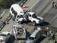 In this aerial image made from a video provided by KABB/WOAI authorities respond to a deadly crash involving a van carrying church members and a pickup truck on U.S. 83 outside Garner State Park in northern Uvalde County, Texas, Wednesday, March 29, 2017. The group of senior adults from First …